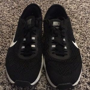 Black Nike training shoes